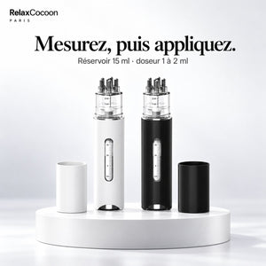 Applicateur Cocoon noir ou blanc, réservoir 15 ml et petit doseur de 1 à 2 ml.