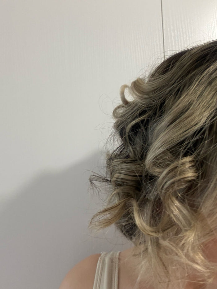Photo jointe à un avis : boucles réalisées avec le mini lisseur